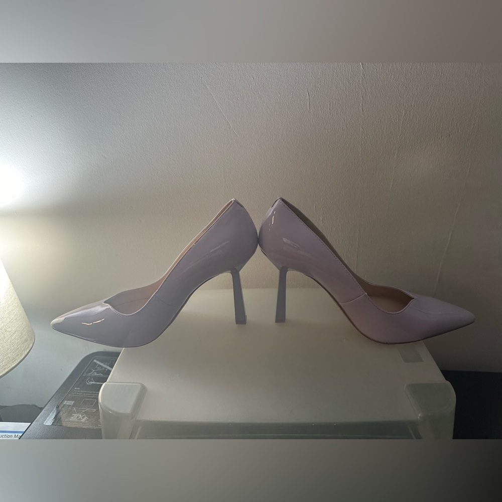 Used  - worn a couple of times - Gorgeous lavender J LO heels